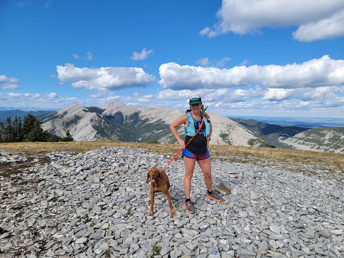 Terry Toffelmire hiking with dog